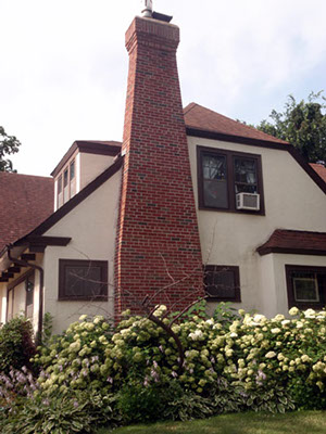 Chimney that was rebuilt form the ground up following the orignal design and using new matching bricks.
