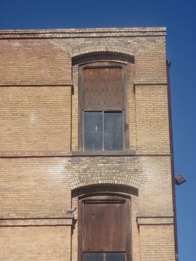 After the brick arches were rebuilt. New bricks were used and they match perfectly with the original brick around it as well as the mortar.