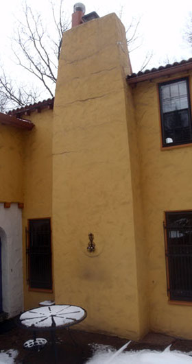 Stucco chimney built with sand-lime bricks which had competely deteriorated and needed to be rebuilt.