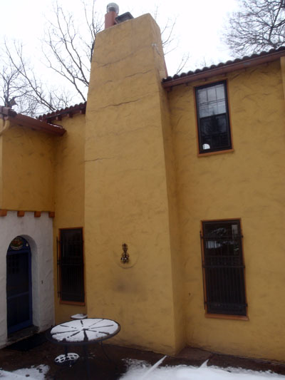 Stucco chimney built with sand-lime bricks which had competely deteriorated and needed to be rebuilt.