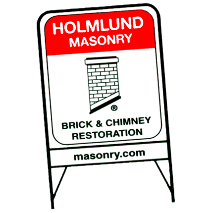 Holmlund Masonry yard sign logo with signature chimney design.